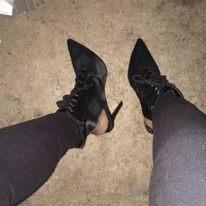 Black pointed lace up ankle boots